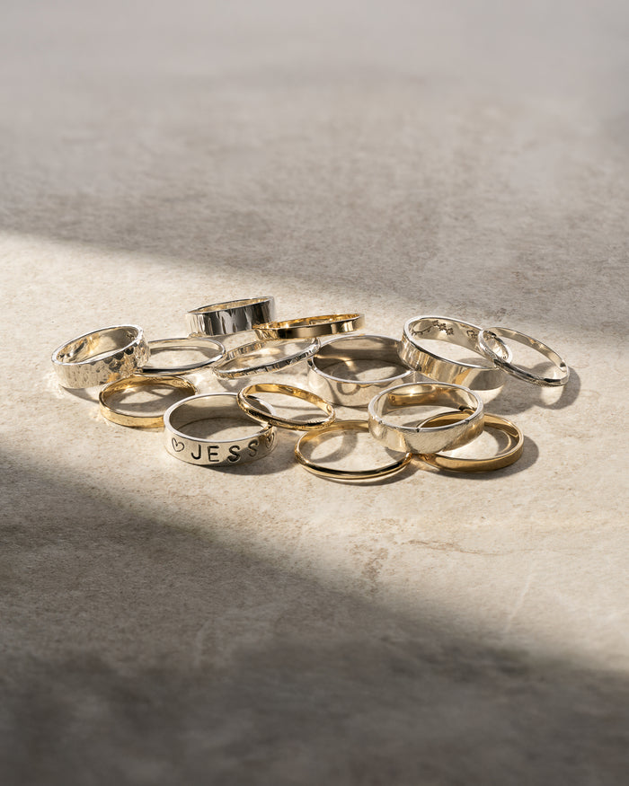 A mix of silver and gold rings