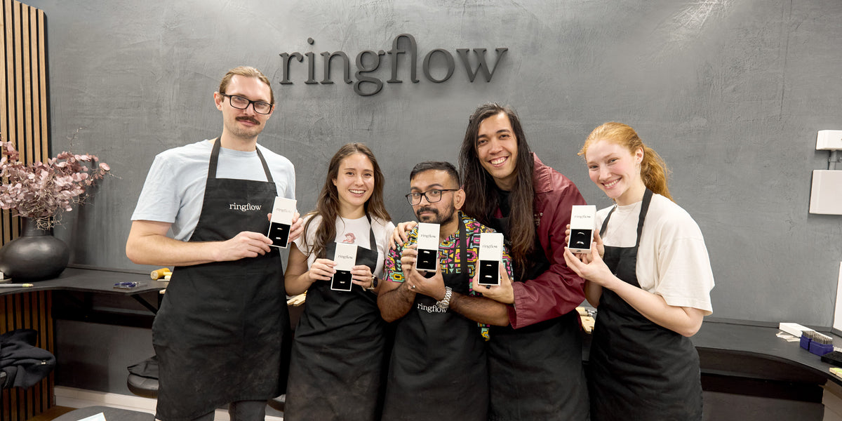 A group holding their boxed handmade rings at the end of a Ringflow class in Prahran